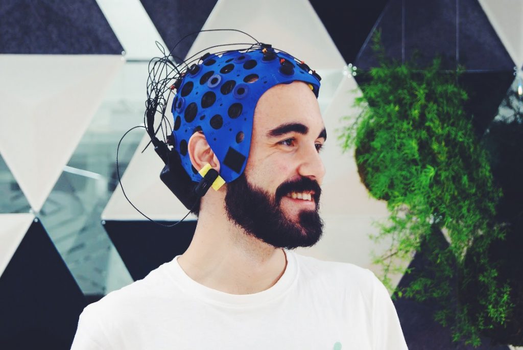 Javi Rameerez wearing a Brain-Computer Interfacing (BCI) headset provided by Bitbrain at Saturdays.AI Madrid @ Loom Princesa